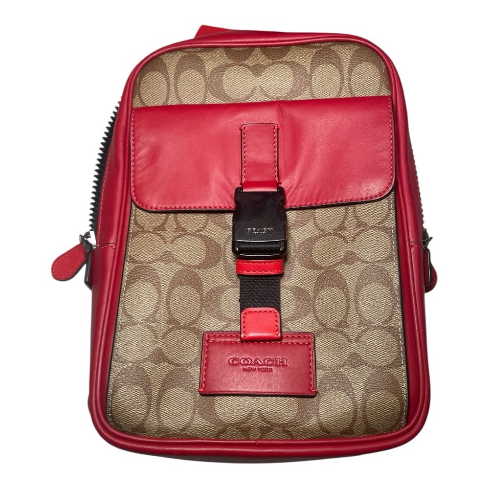 Gently used signature  Coach and red leather one shoulder track bag